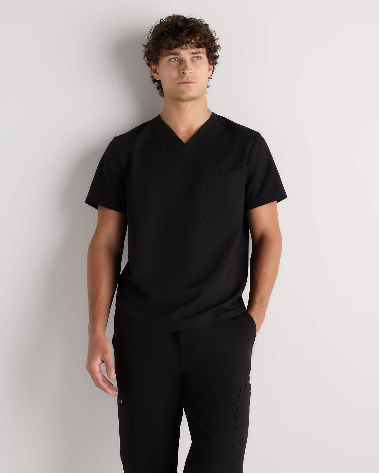 Bold Black AeraFlex 3-Pocket Scrub Top