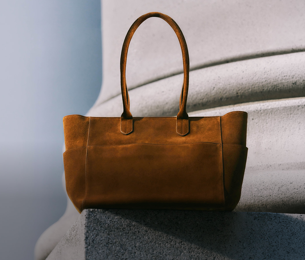 Fall Collection Hero Carousel slide 2 — Hudson Suede Tote, Whiskey. Sep 2026.