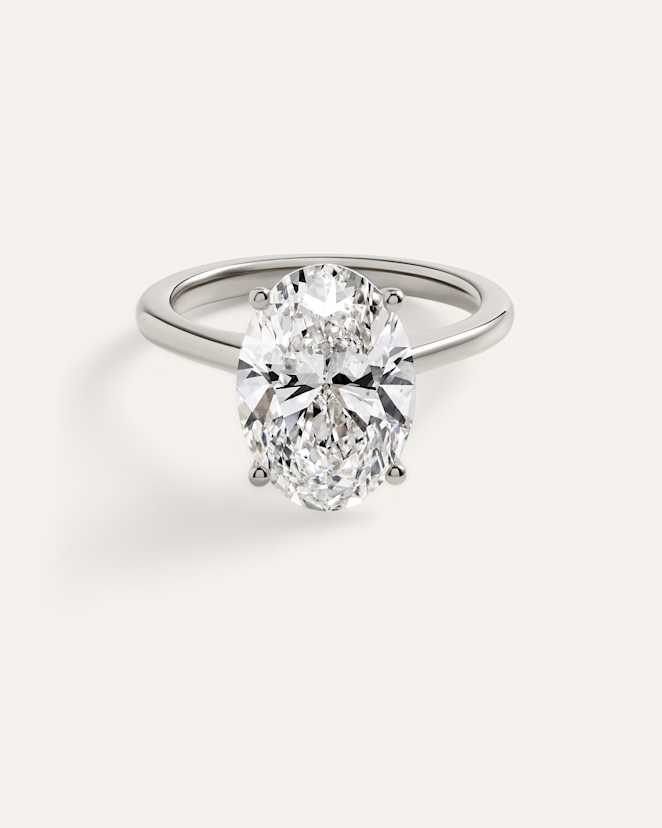 White Gold Lab Grown Diamond Oval Trellis Cathedral Engagement Ring - 5ct