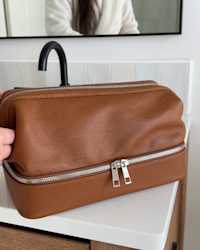 Italian Leather Dual Compartment Toiletry Bag - PDP Video Thumbnail (Cognac, 4x5)