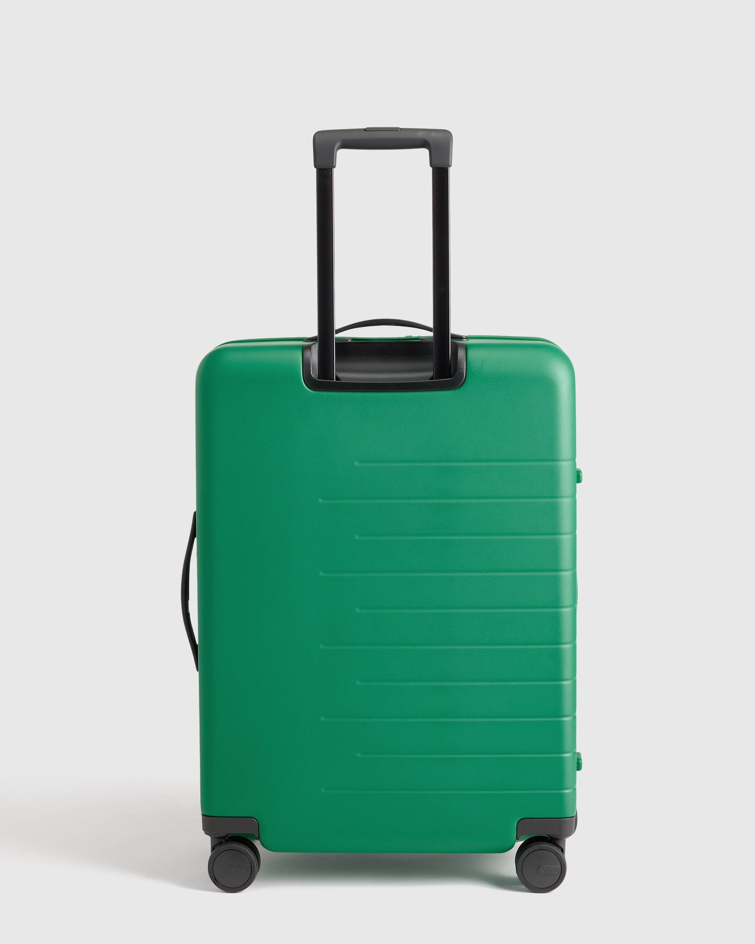 Expandable Medium Check-In Suitcase in Emerald Jungle