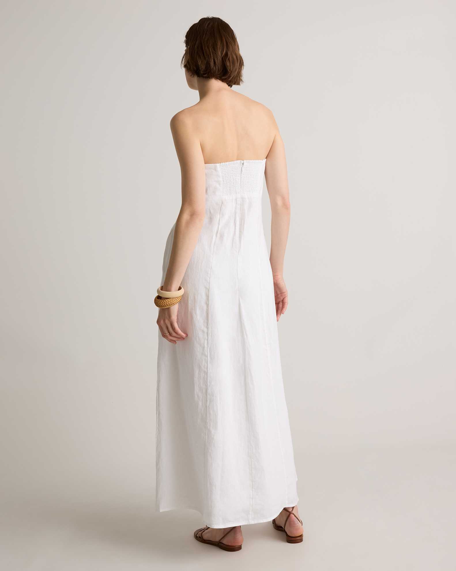 blanc linen strapless panelled maxi dress As Seen On @mcleodmanna wears the most-loved Blanc Linen Strapless Panelled Maxi Dress. Now back in stock, shop at the link in bio. #ShonaJoy