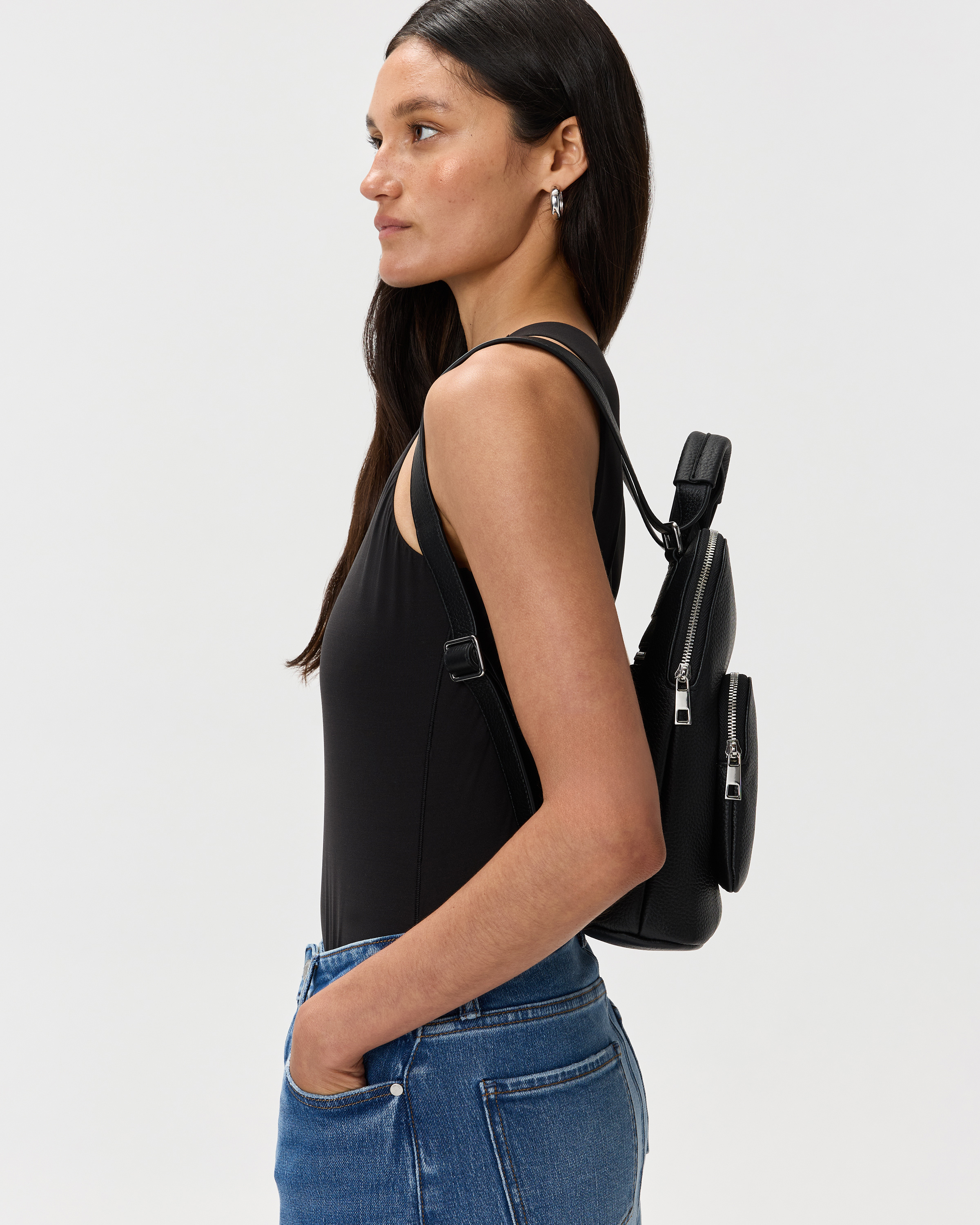 amerileather quince leather convertible backpack Urban Buckle Flap Backpack; Dark Brown The sturdy leather carrying handle let you transport the bag without using the back straps Women's Italian Leather Mini Convertible
