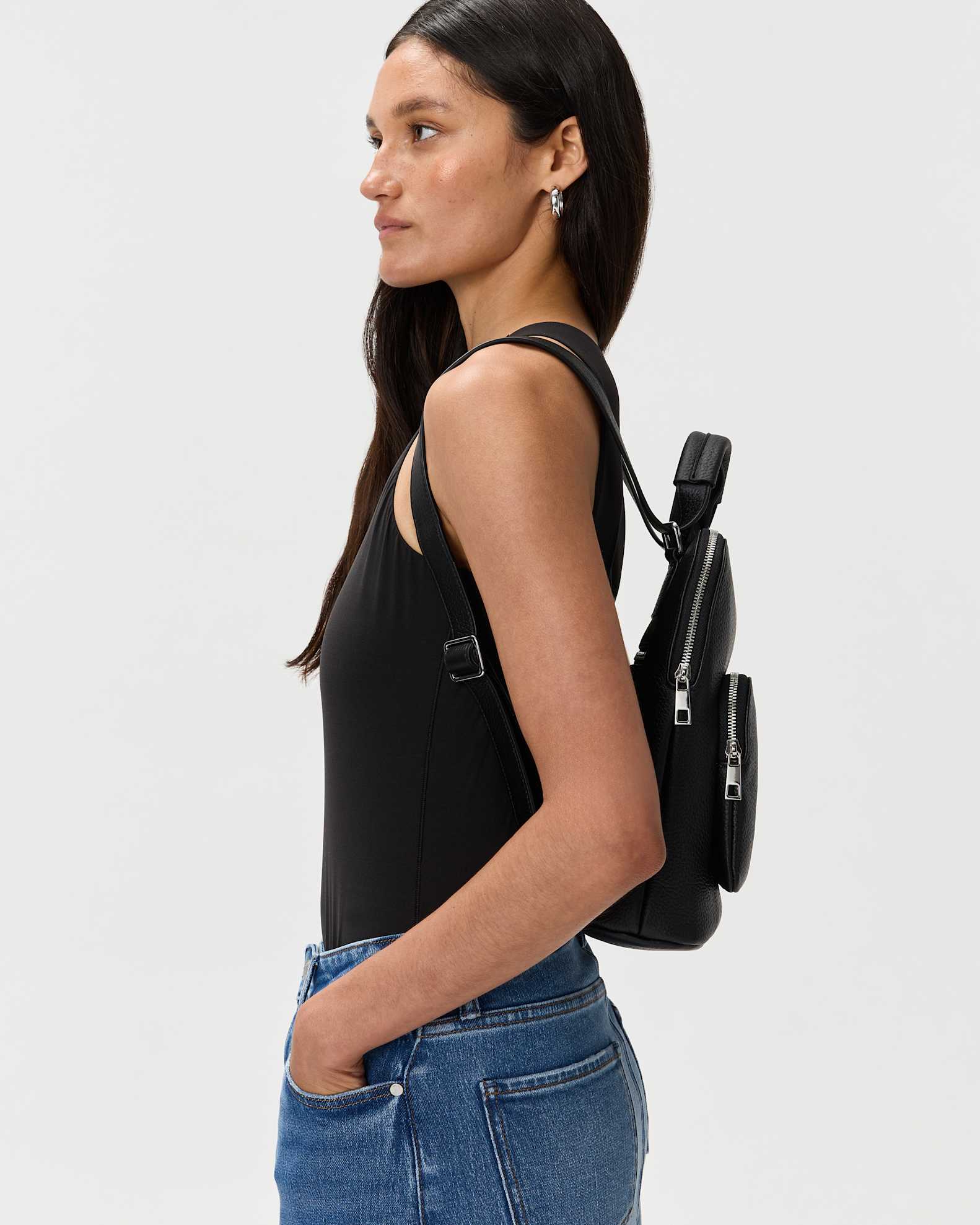 amerileather quince leather convertible backpack Urban Buckle Flap Backpack; Dark Brown The sturdy leather carrying handle let you transport the bag without using the back straps Women's Italian Leather Mini Convertible