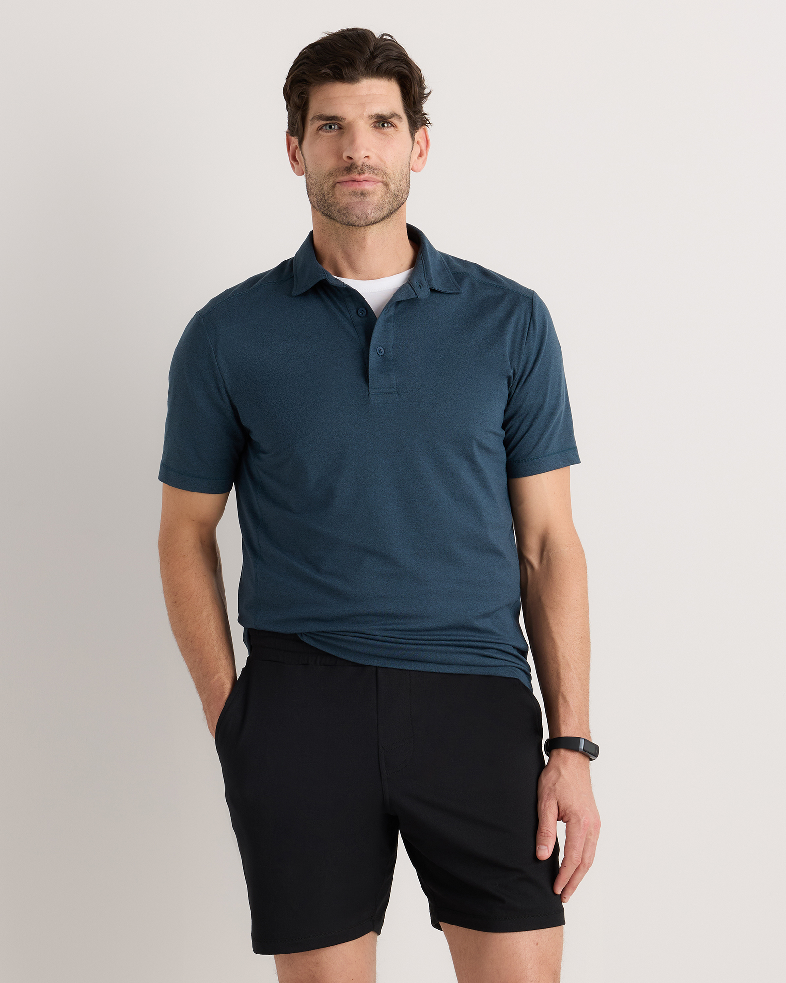 Heather Ocean Navy Flowknit Breeze Performance Polo