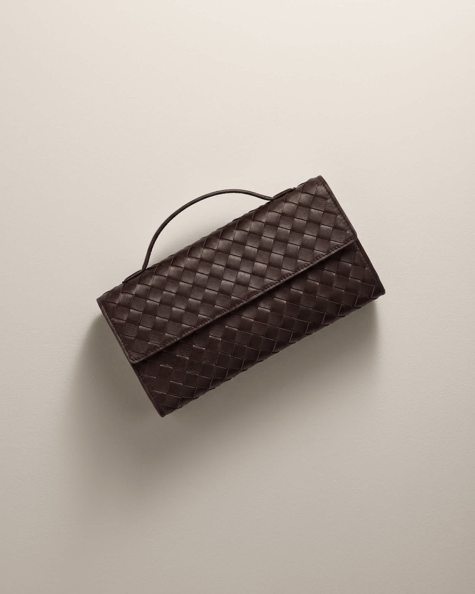 Leather Handwoven Top Handle Clutch