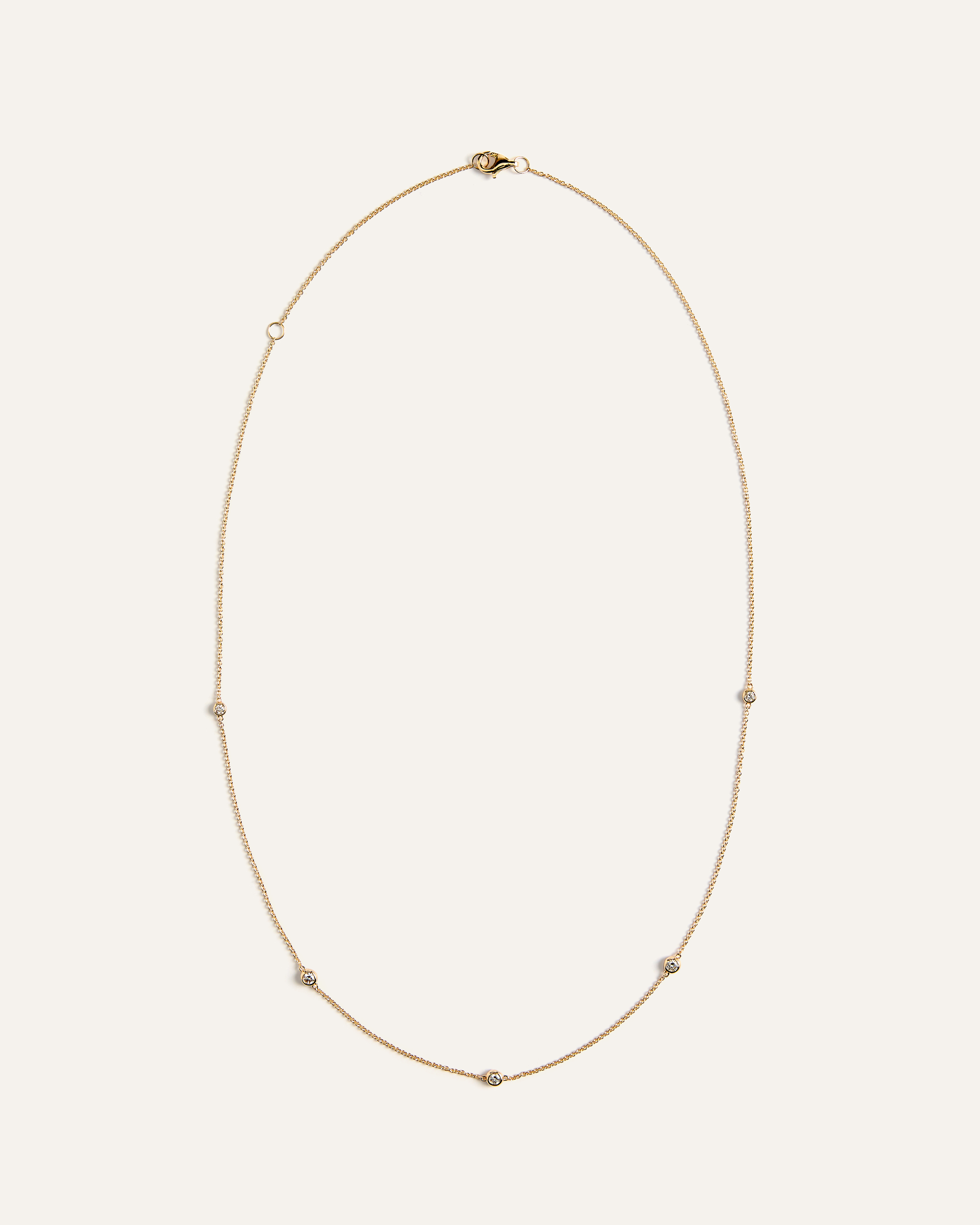 Yellow Gold Collier en or 14 carats à diamants espacés sertis clos