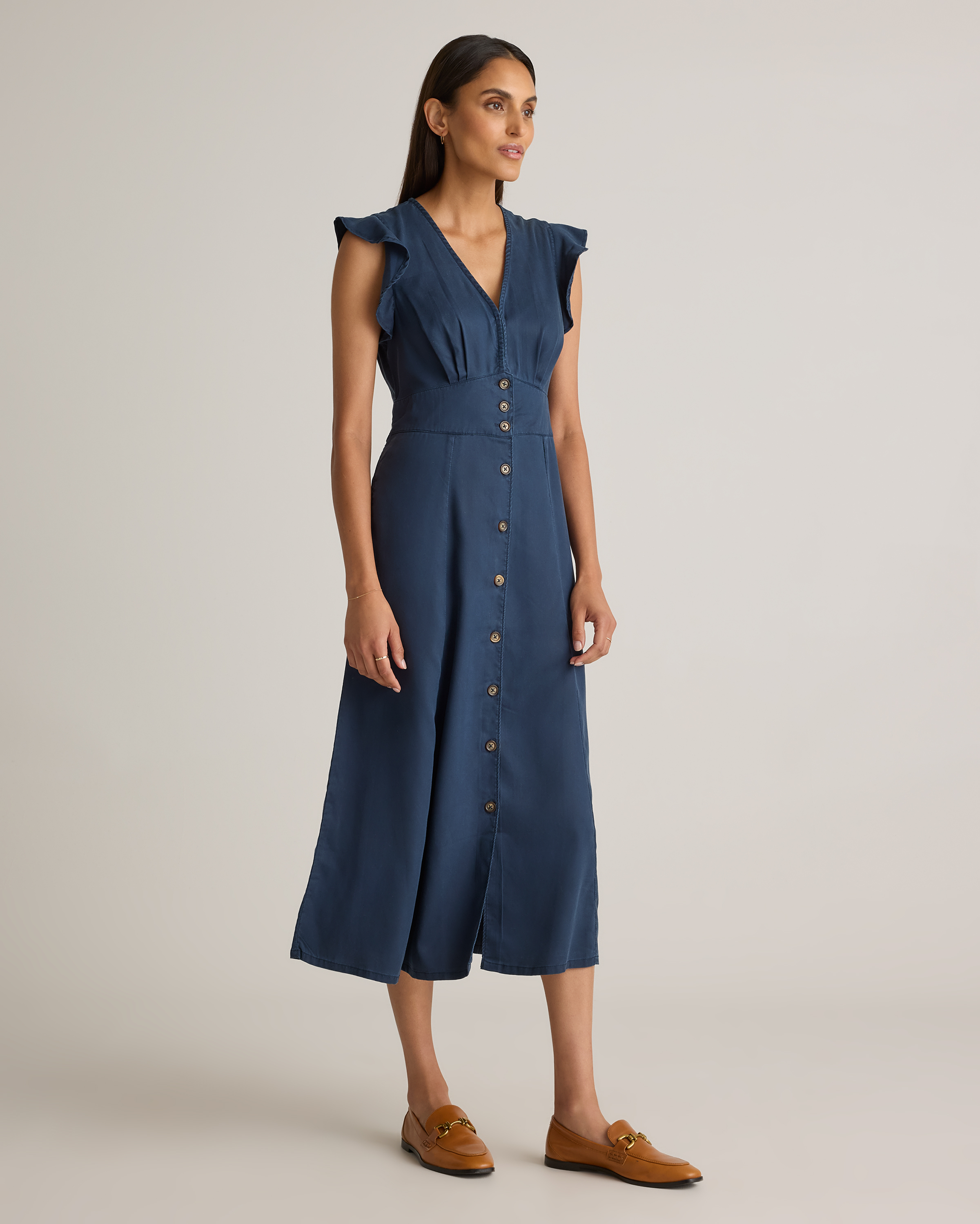 woman in blue vintage wash tencel button front midi dress