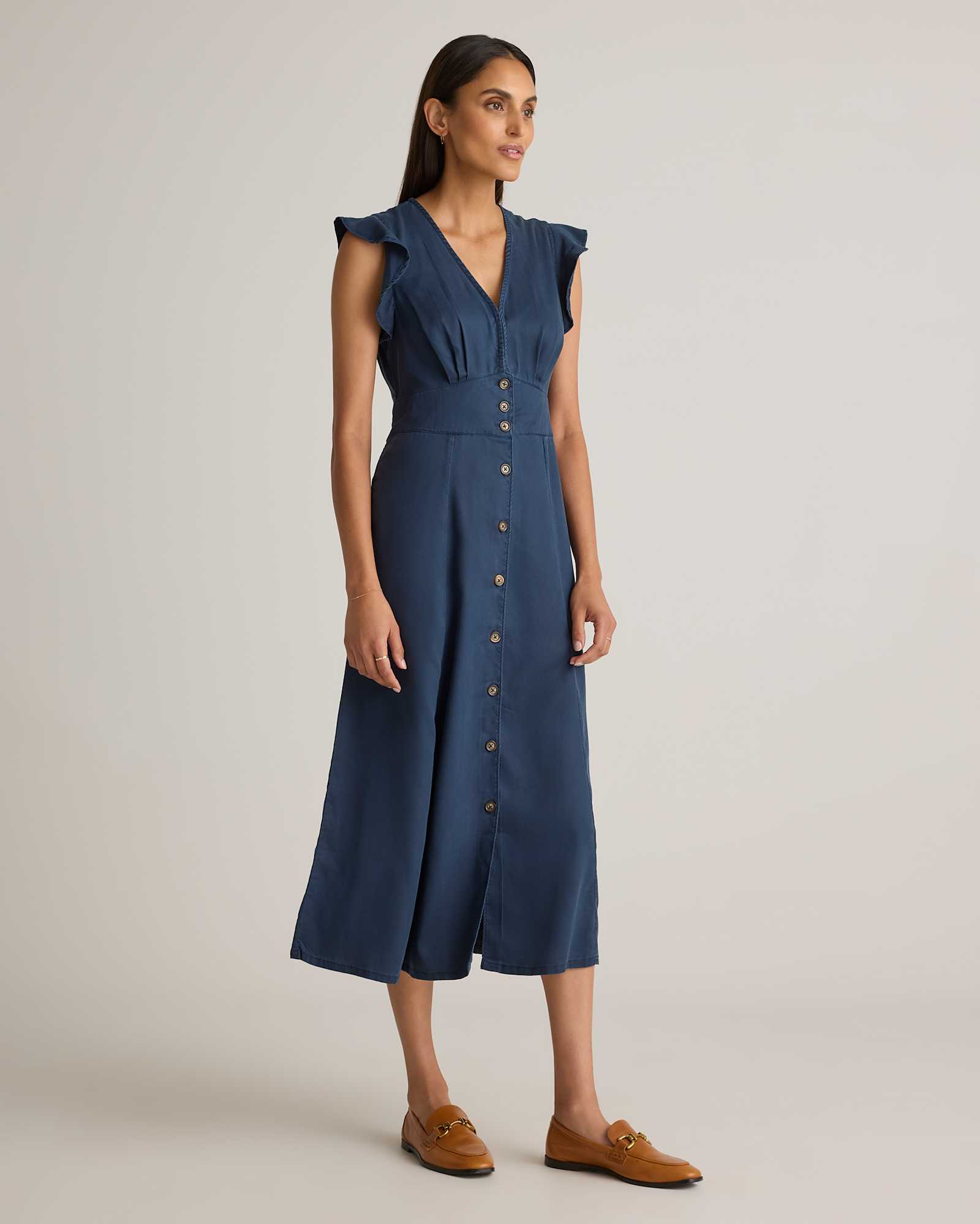 woman in blue vintage wash tencel button front midi dress