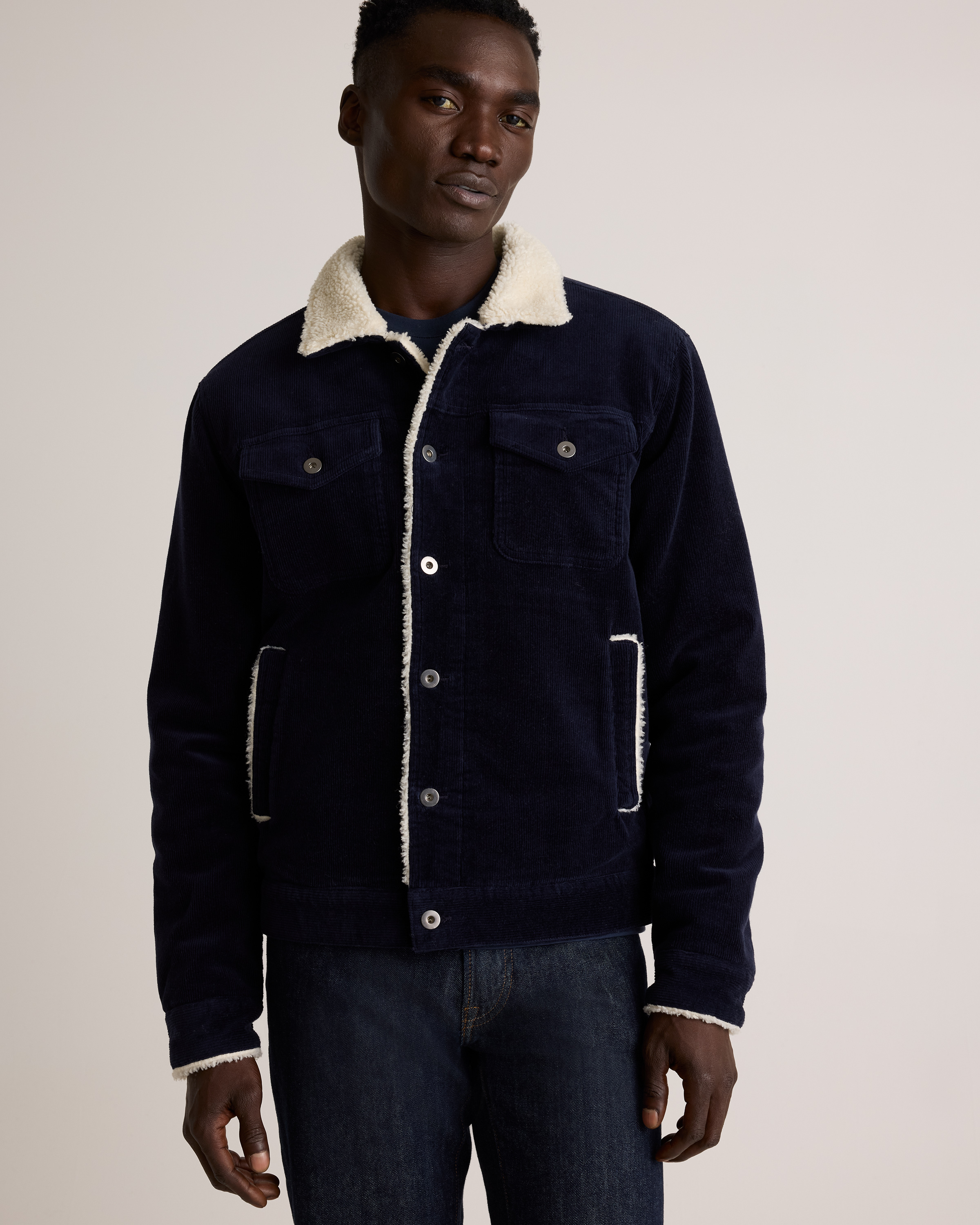 Organic Stretch Corduroy Sherpa-Lined Trucker Jacket in Deep Navy