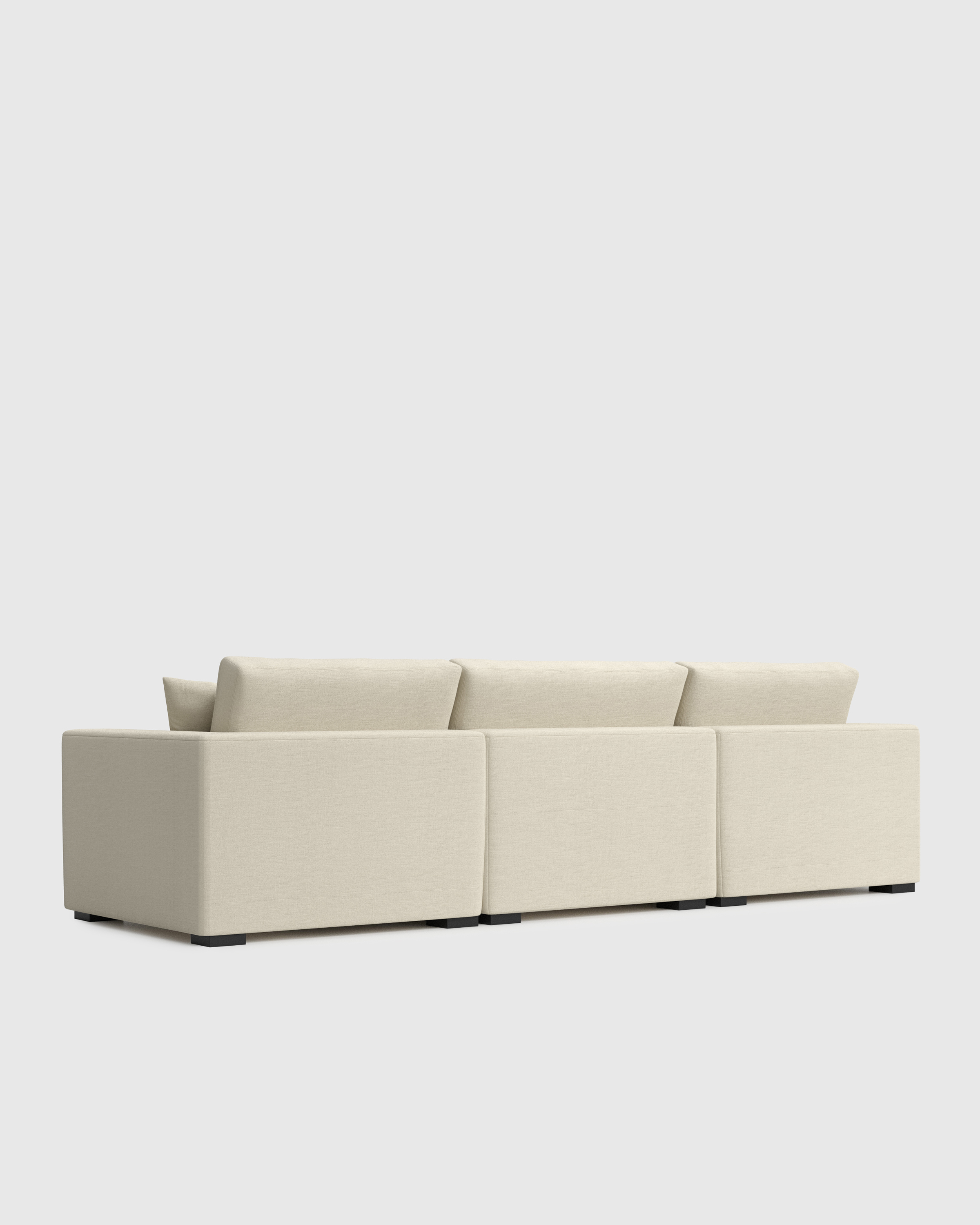 Oasis 4-Piece Chaise Sectional Left Arm Sand Back Angle
