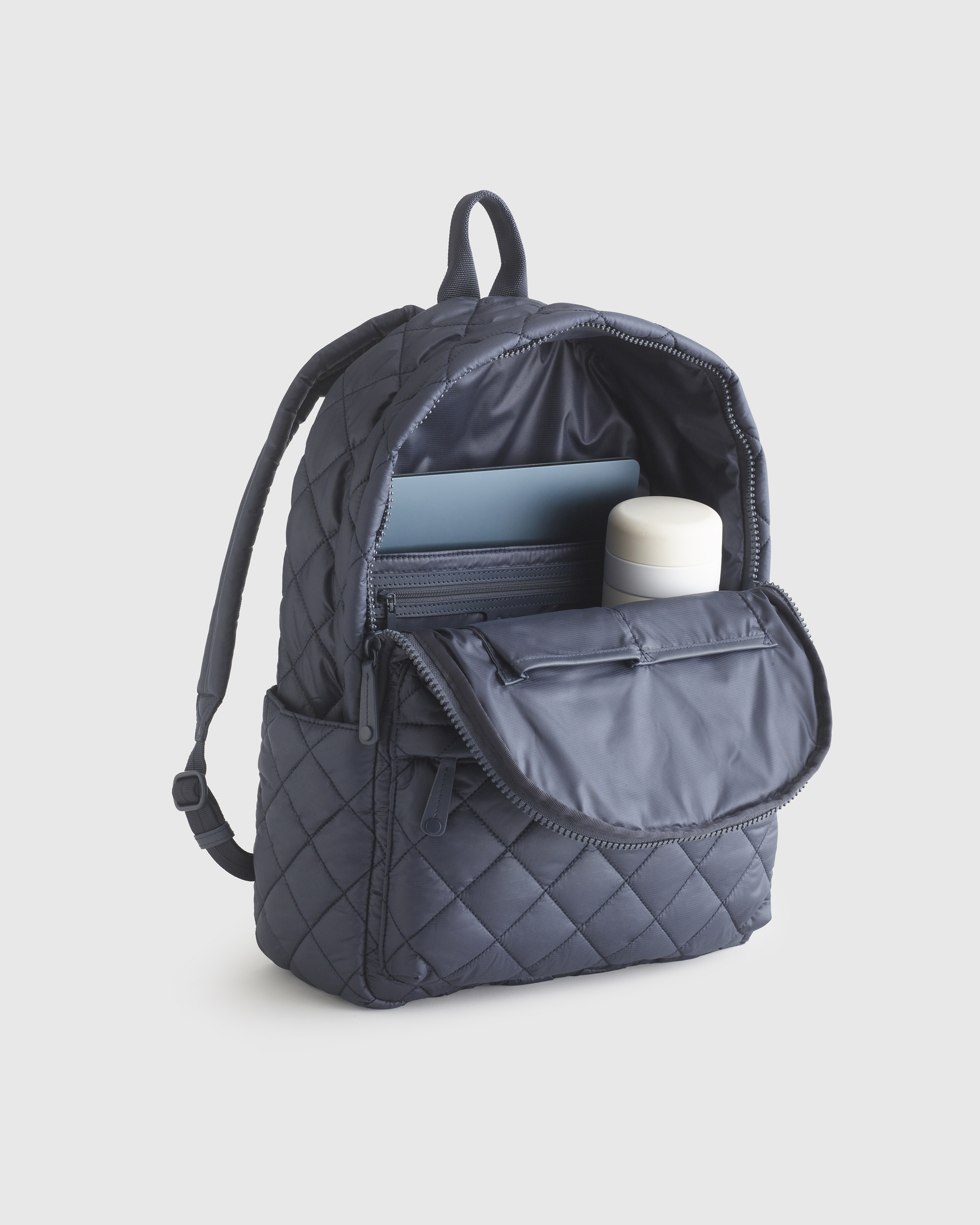 vakt.Knapsack / BROWN✖️NAVY Transit Quilted Commuter Backpack in Navy