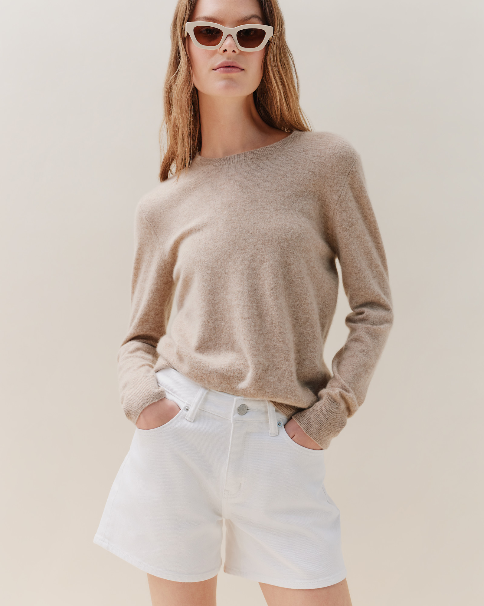 Quince Mongolian cashmere crewneck sweater in oatmeal, worn