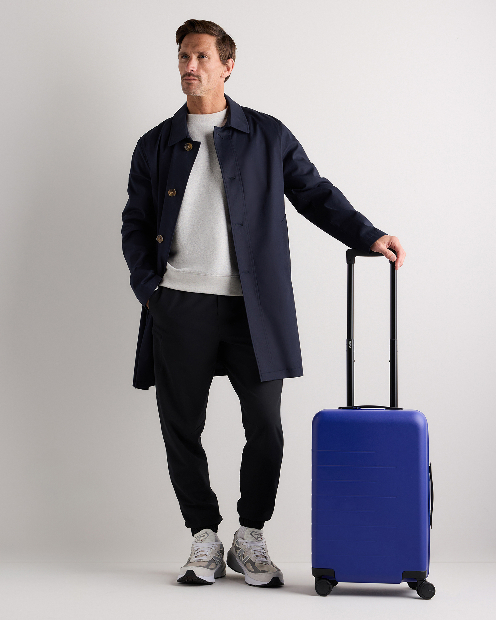 Small Carry-On Suitcase in Coastal Cobalt