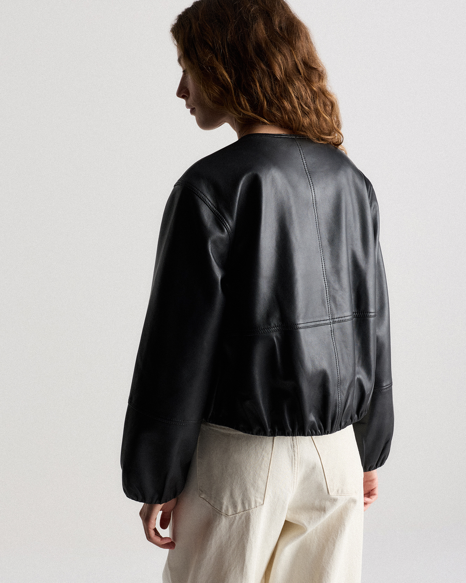 100% Leather Collarless Cropped Bubble Hem Jacket in True Black