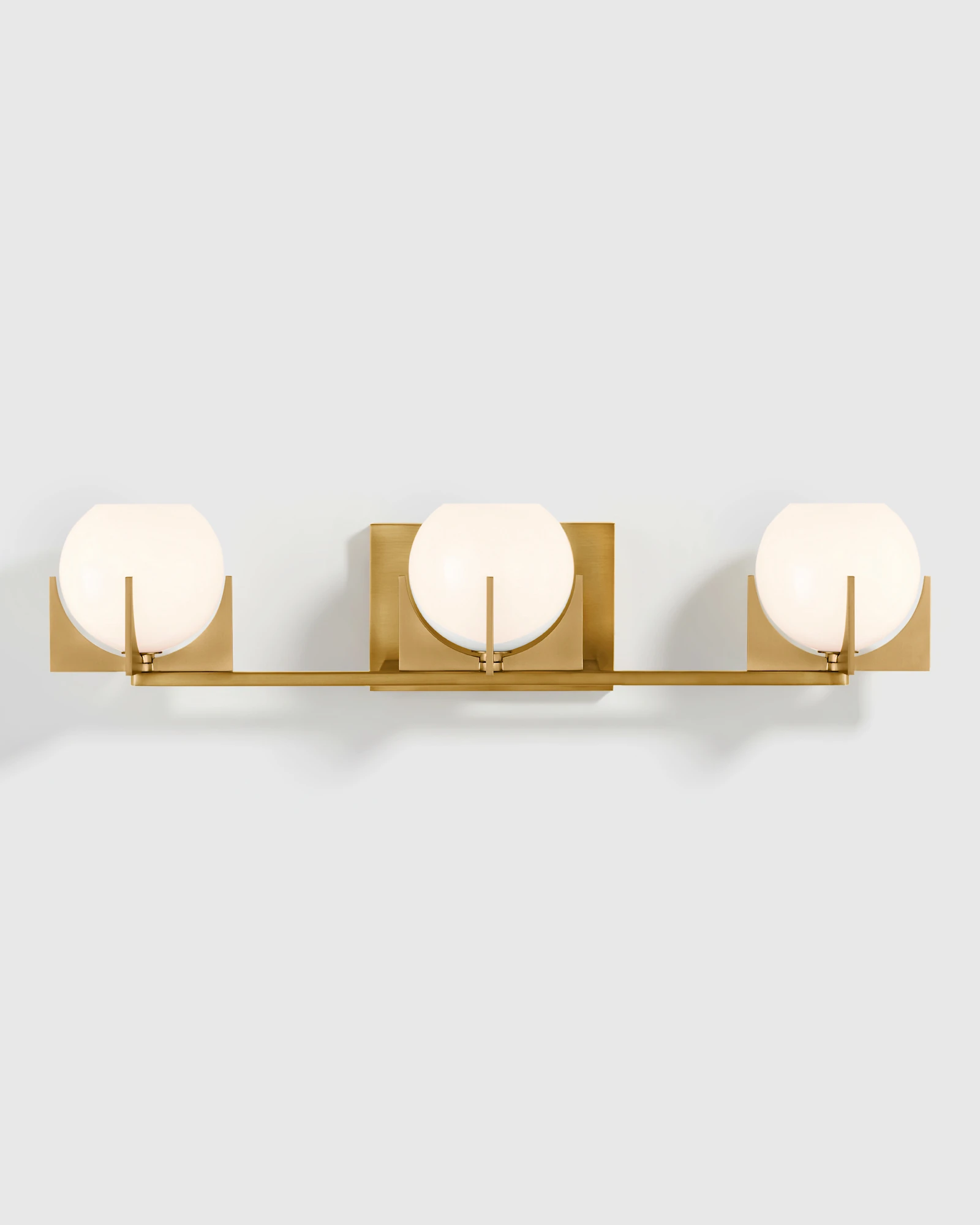 Deco Glass Globe Vanity Sconce in Brass