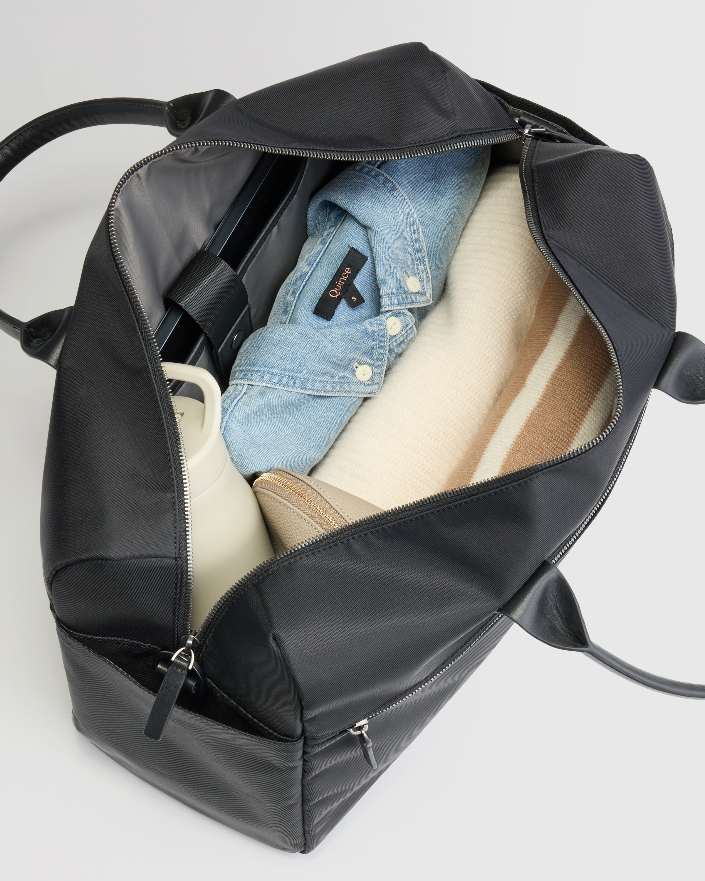 VOYAGEページ Voyage Nylon Travel Duffle in Black
