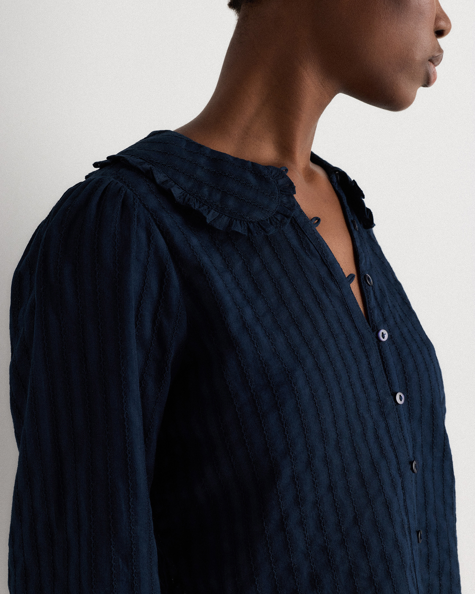 Embroidered Cotton Ruffle Collar Long Sleeve Blouse in Solid Navy