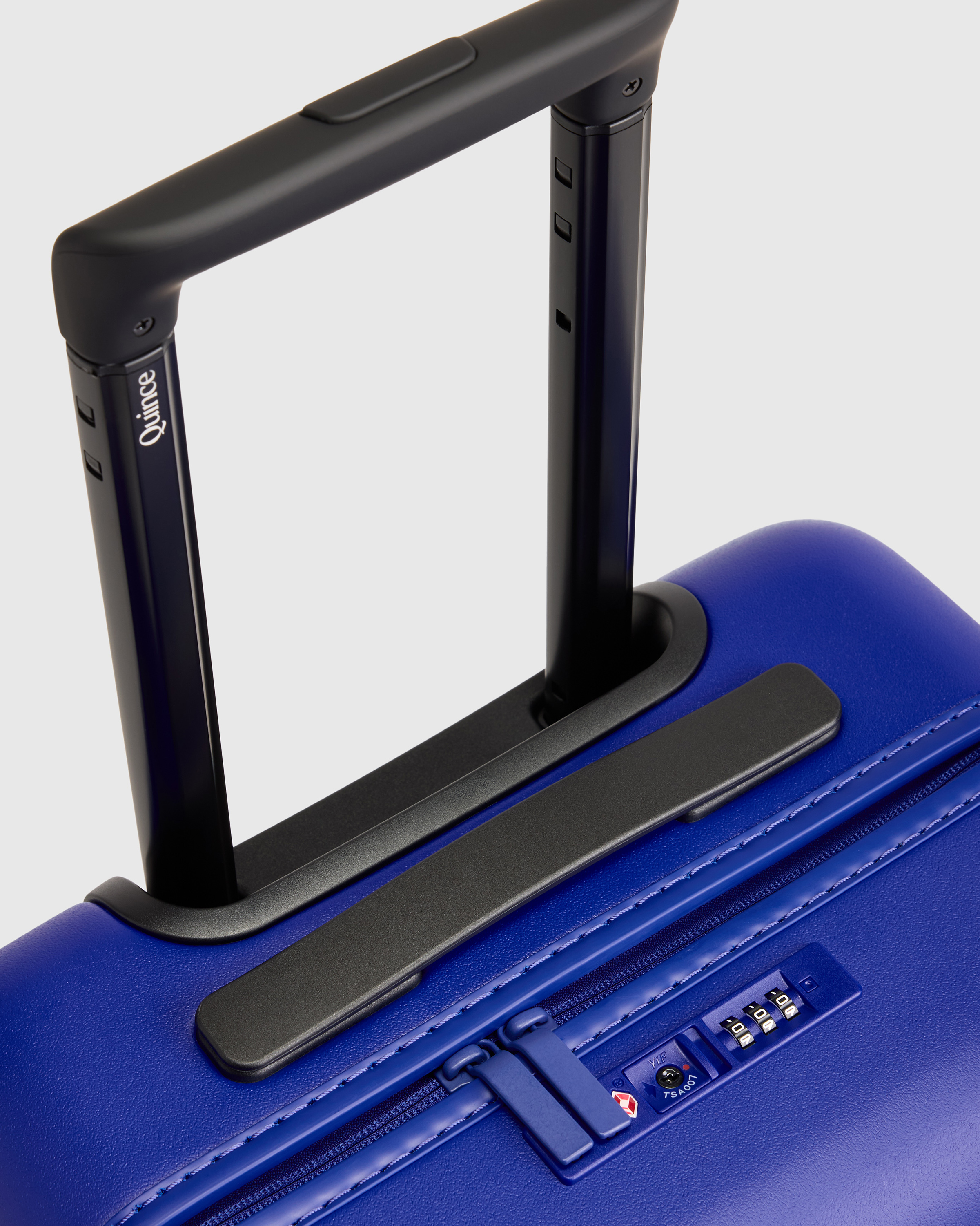 Small Carry-On Suitcase in Coastal Cobalt