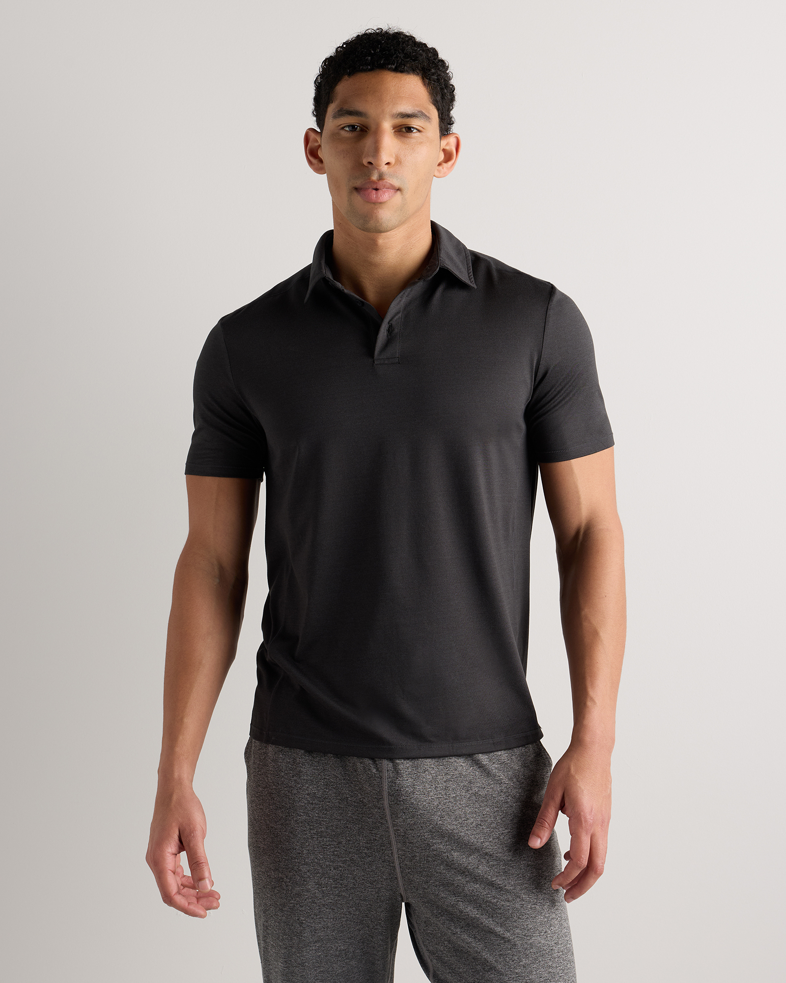 Heather Black Flowknit Breeze Performance Polo