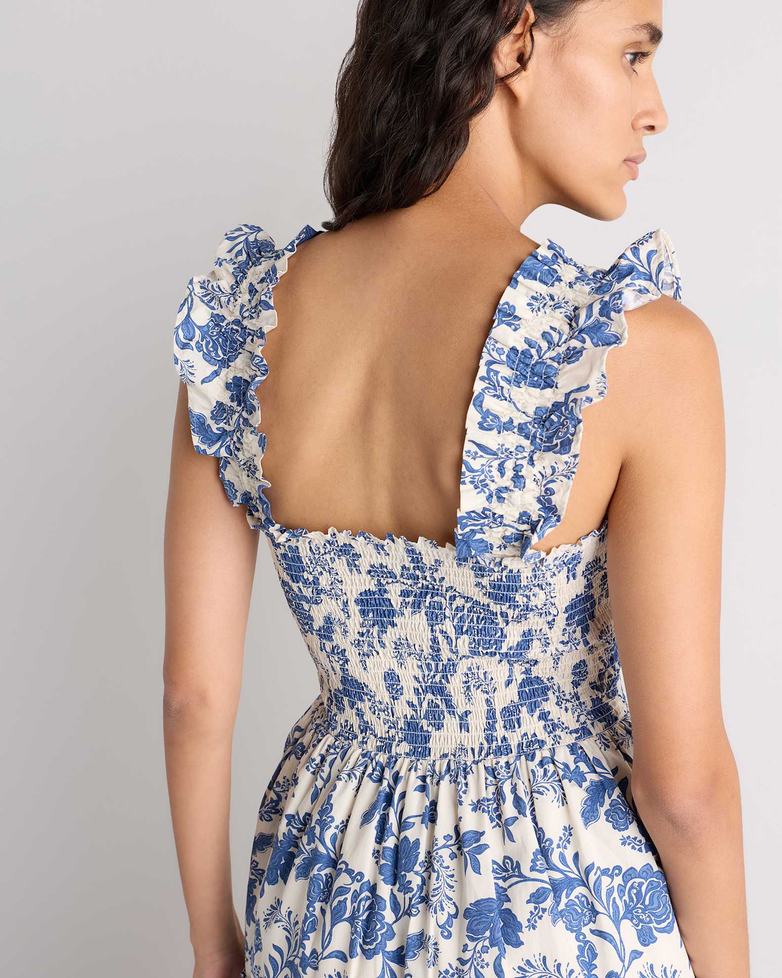 quince midi dress 100% Organic Cotton Eyelet Smocked in Navy This sleeveless midi dress features a higher tank neckline with a back button closure 100% European Linen Fit &