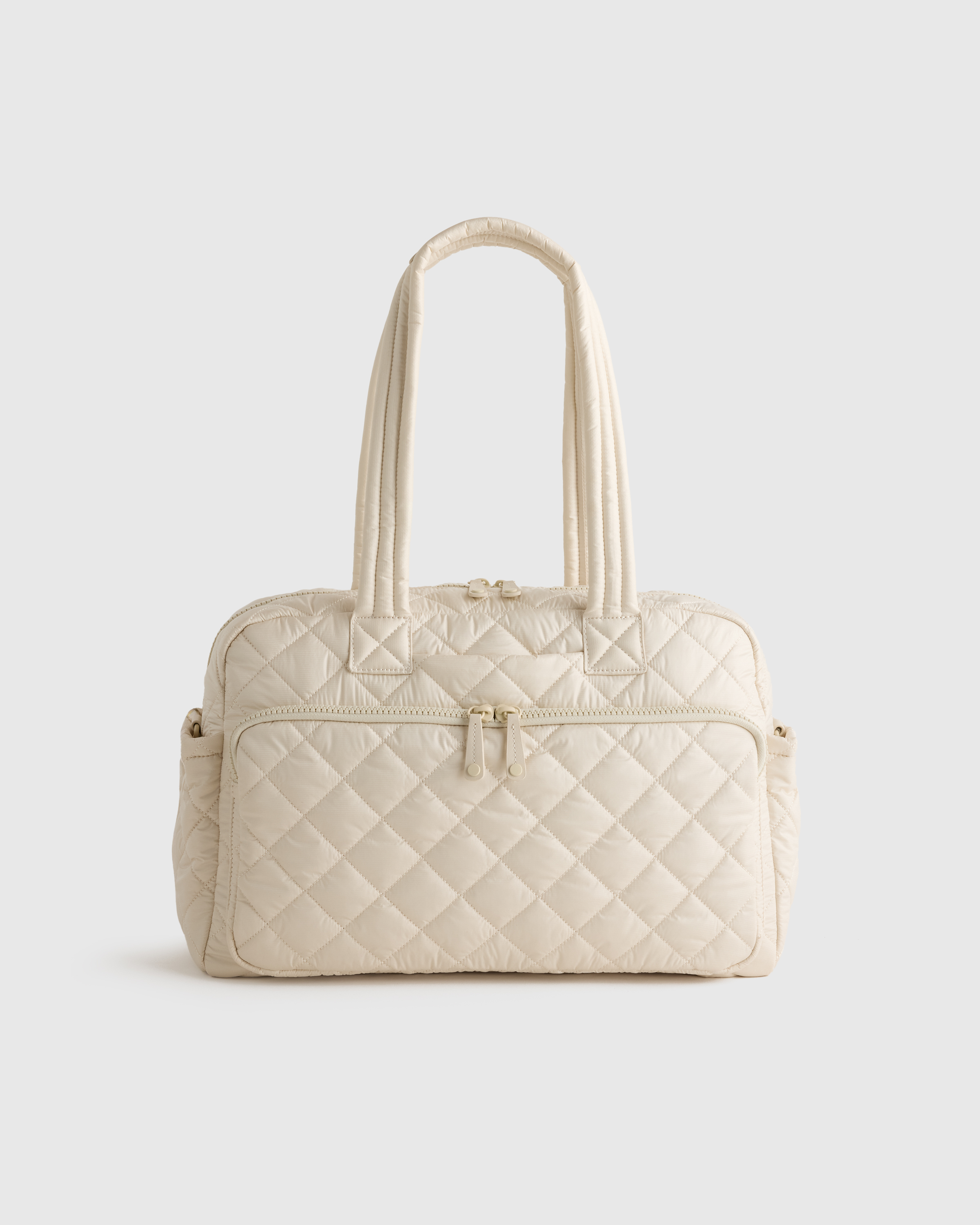 Linen White Transit Quilted Duffle Bag
