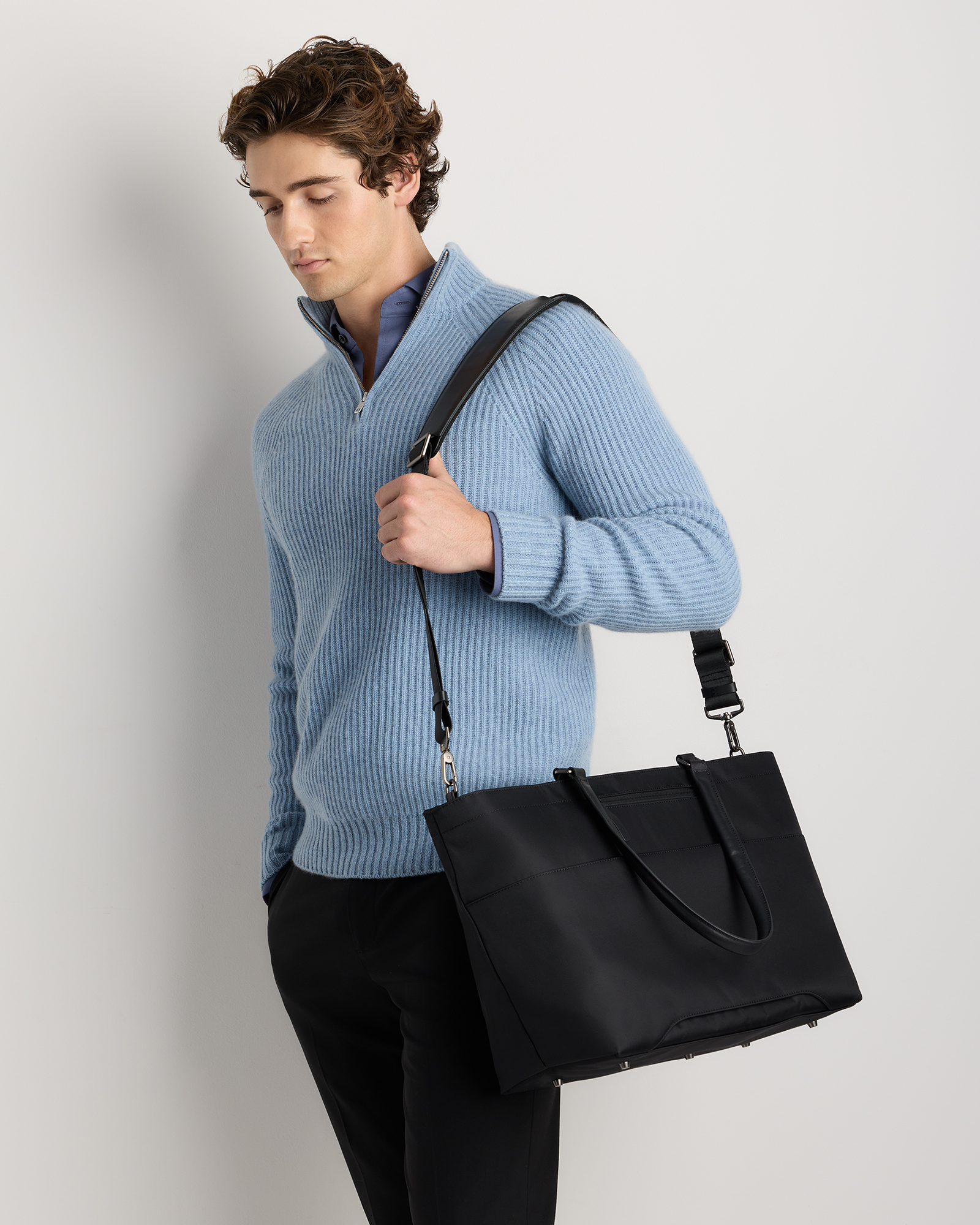 black nylon travel tote bag Voyage Nylon Travel Tote in Black by Quince