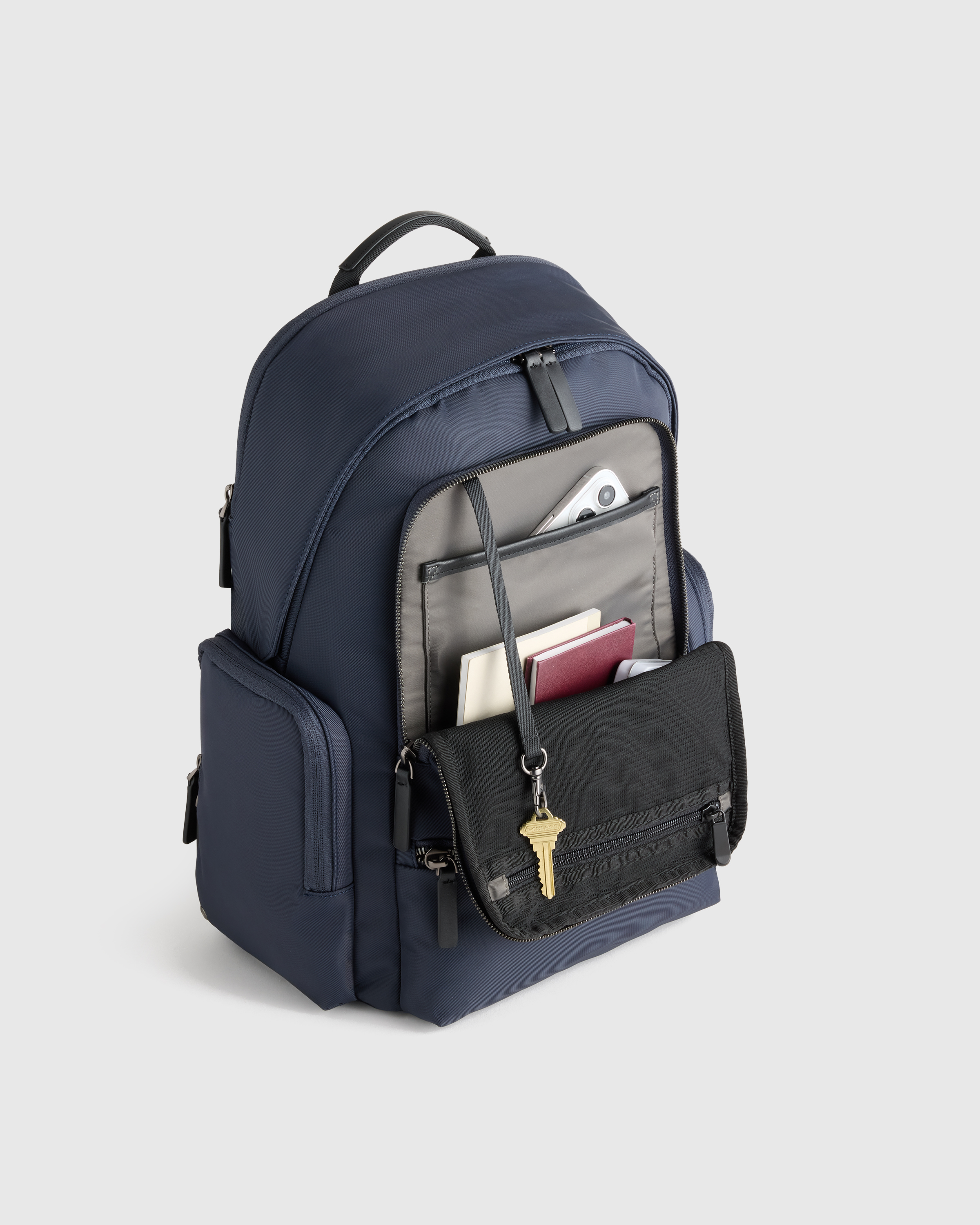 Voyage Nylon Commuter Backpack in Navy | Quince Canada