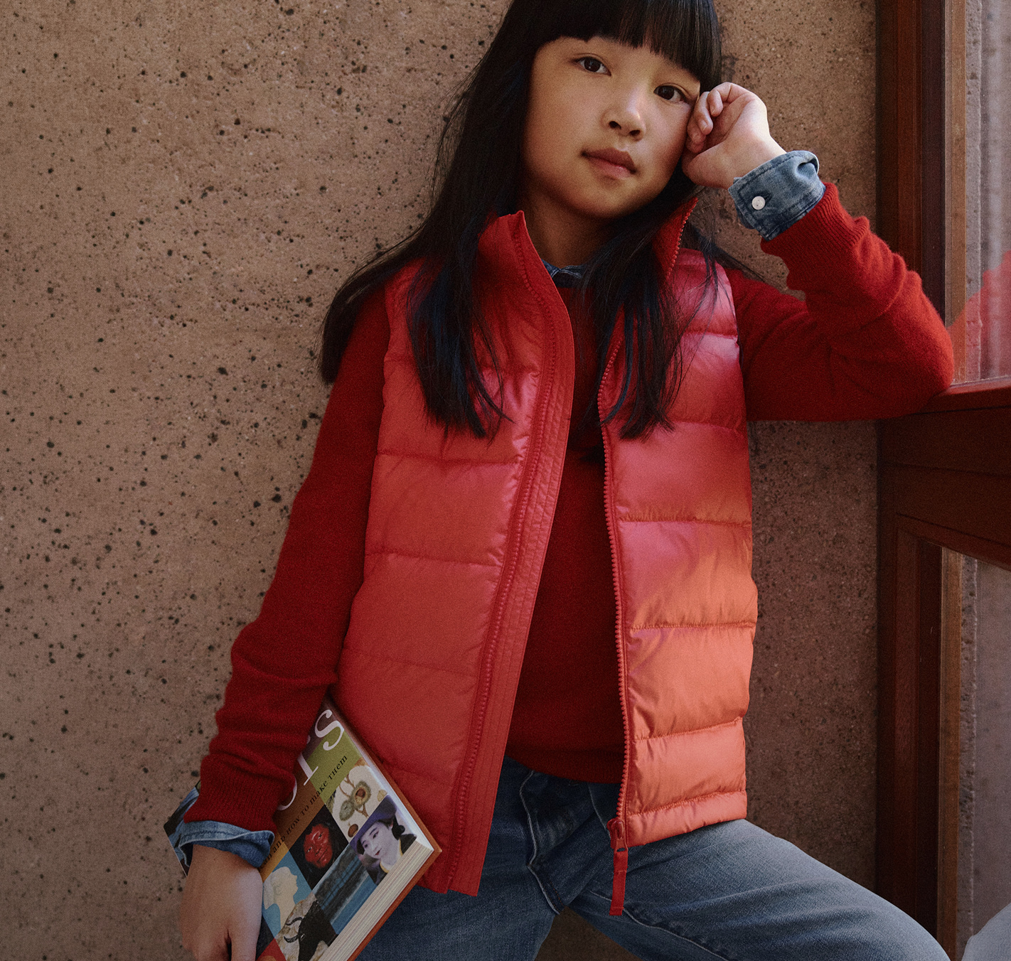 Container 3 banner — Top of the class. Lightweight Down Puffer Gilet in Soft Red with Washable Cashmere Crewneck in Varsity Red, Sep 2026.