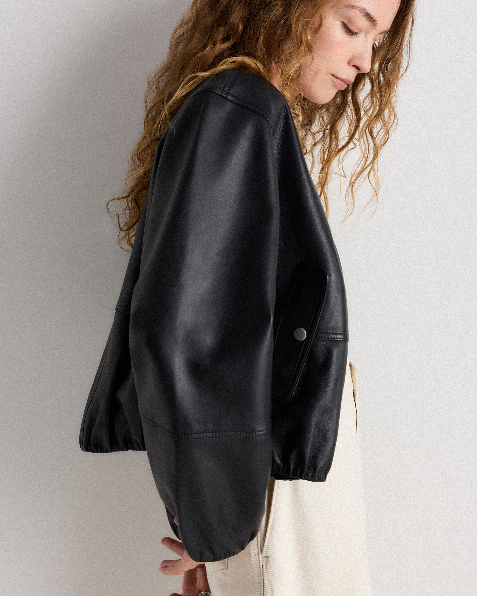 100% Leather Collarless Cropped Bubble Hem Jacket in True Black